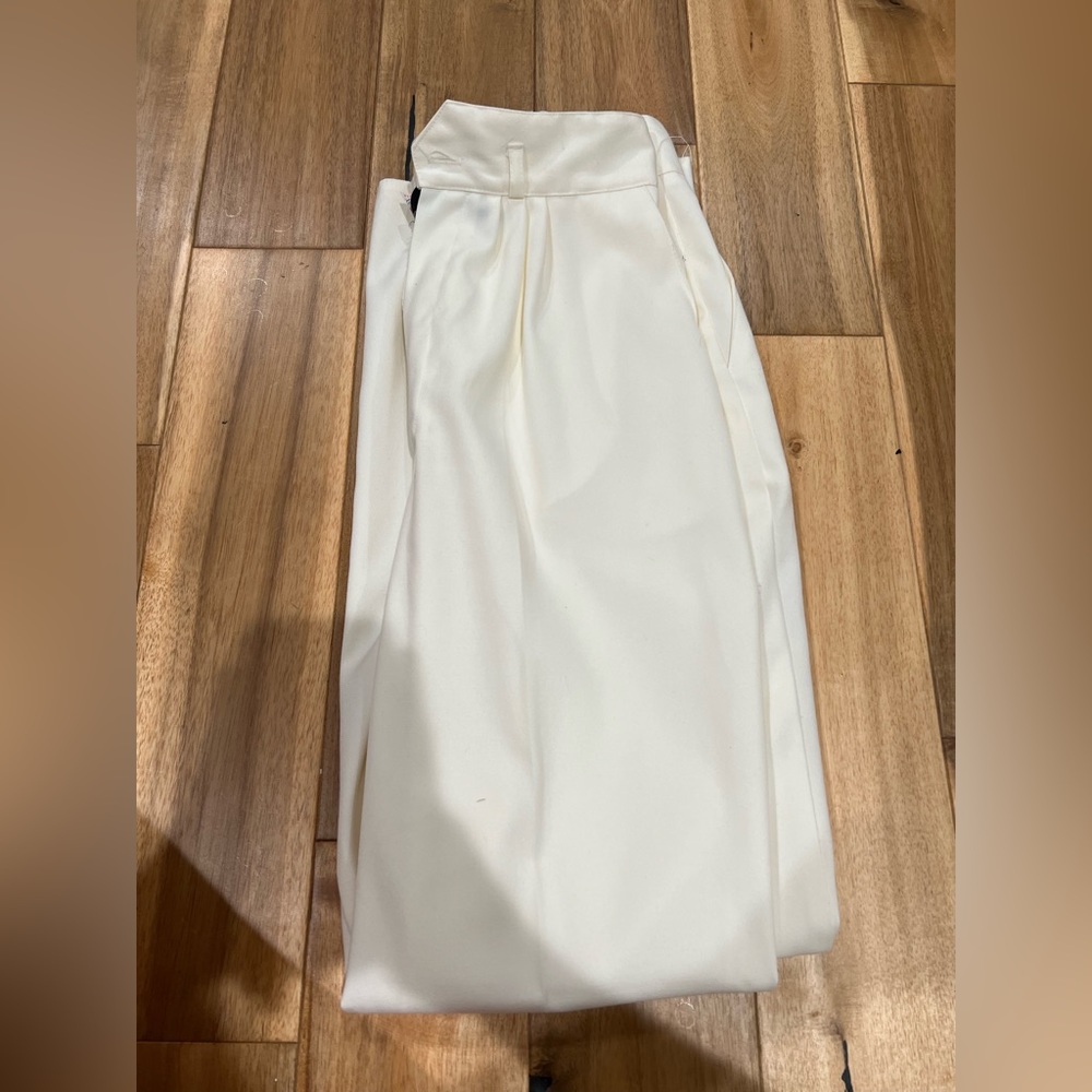 Cream colored trousers